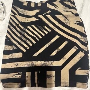 Black and Tan Decree mini skirt‎ size small.